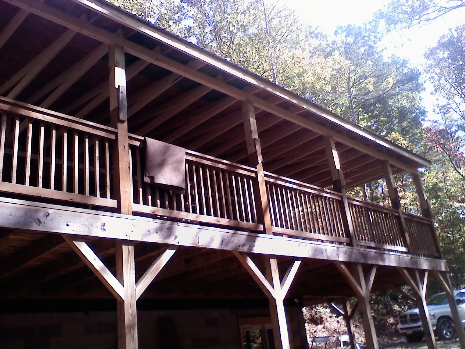Timber framing under a new elevated porch and deck — Roof Leak Repair in Burden by Roofing Brothers